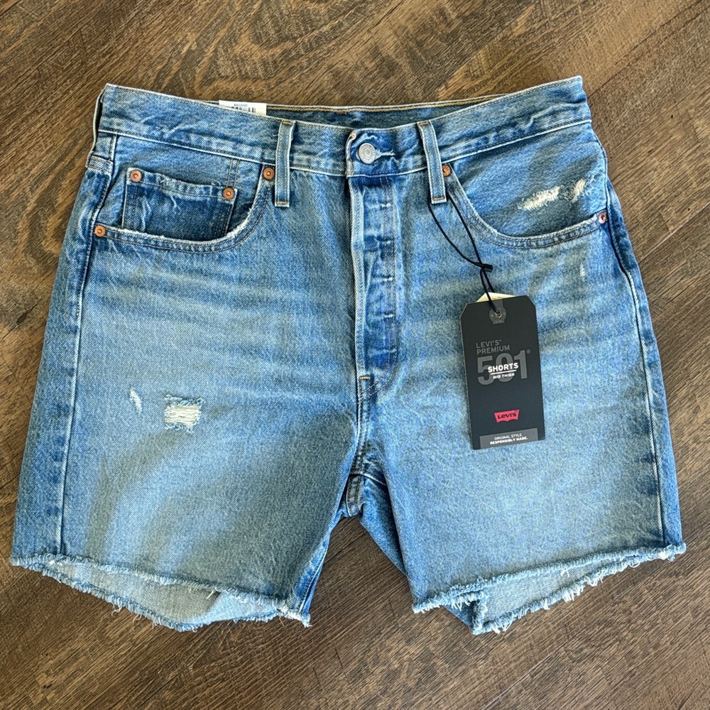 Levi's 501 mid thigh Light Blue Distressed Jean Shorts